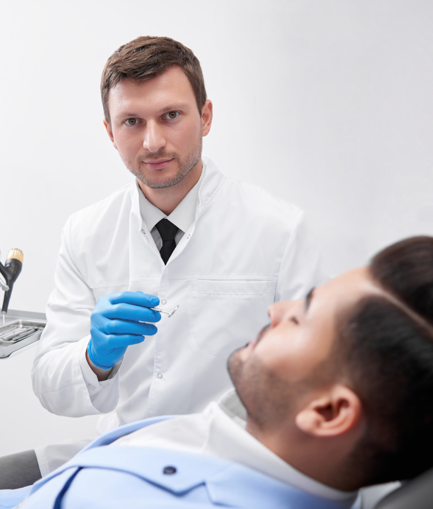 Young Man Visiting Dentist Beugef6.jpg